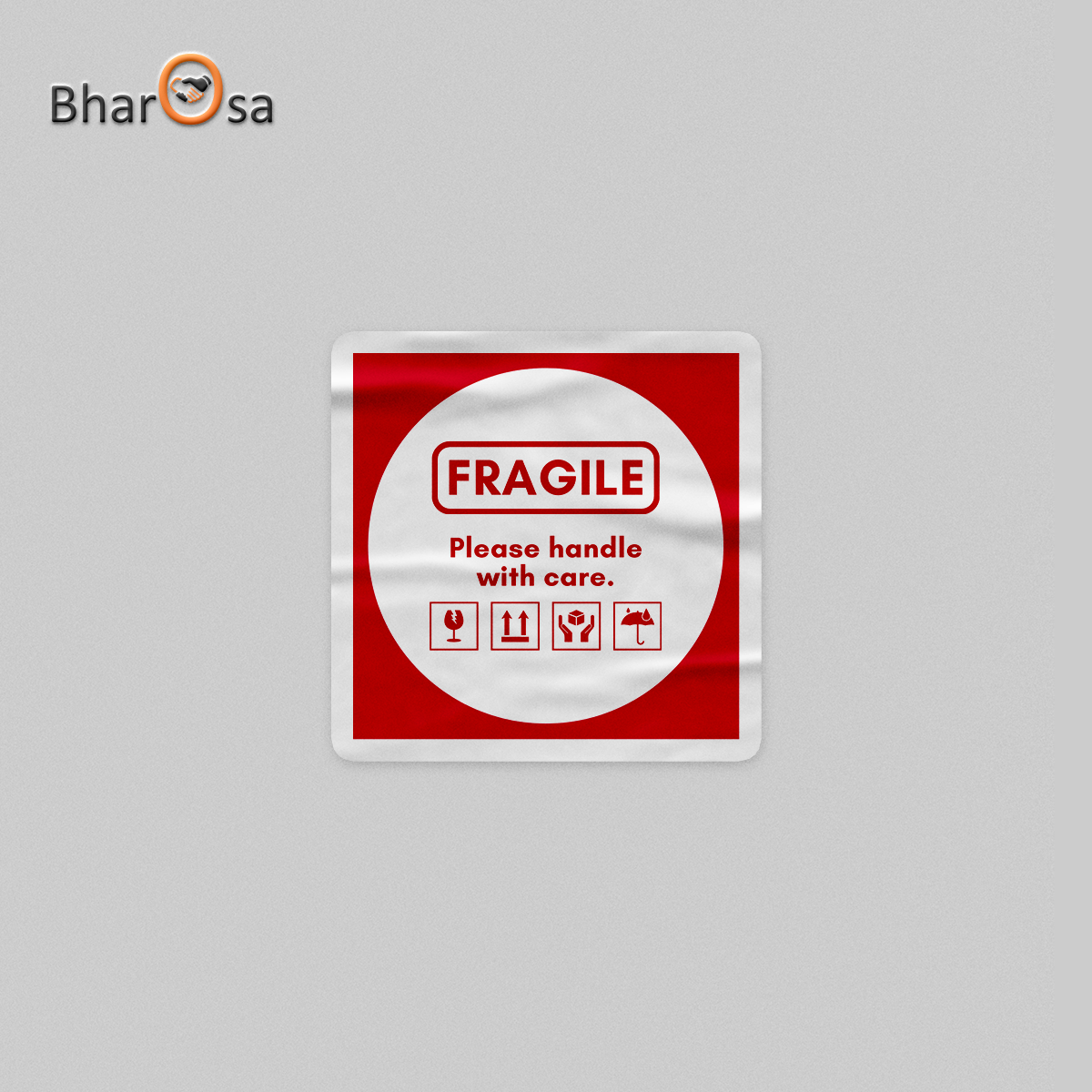 Fragile handling label on a gray background with Bharosa branding.