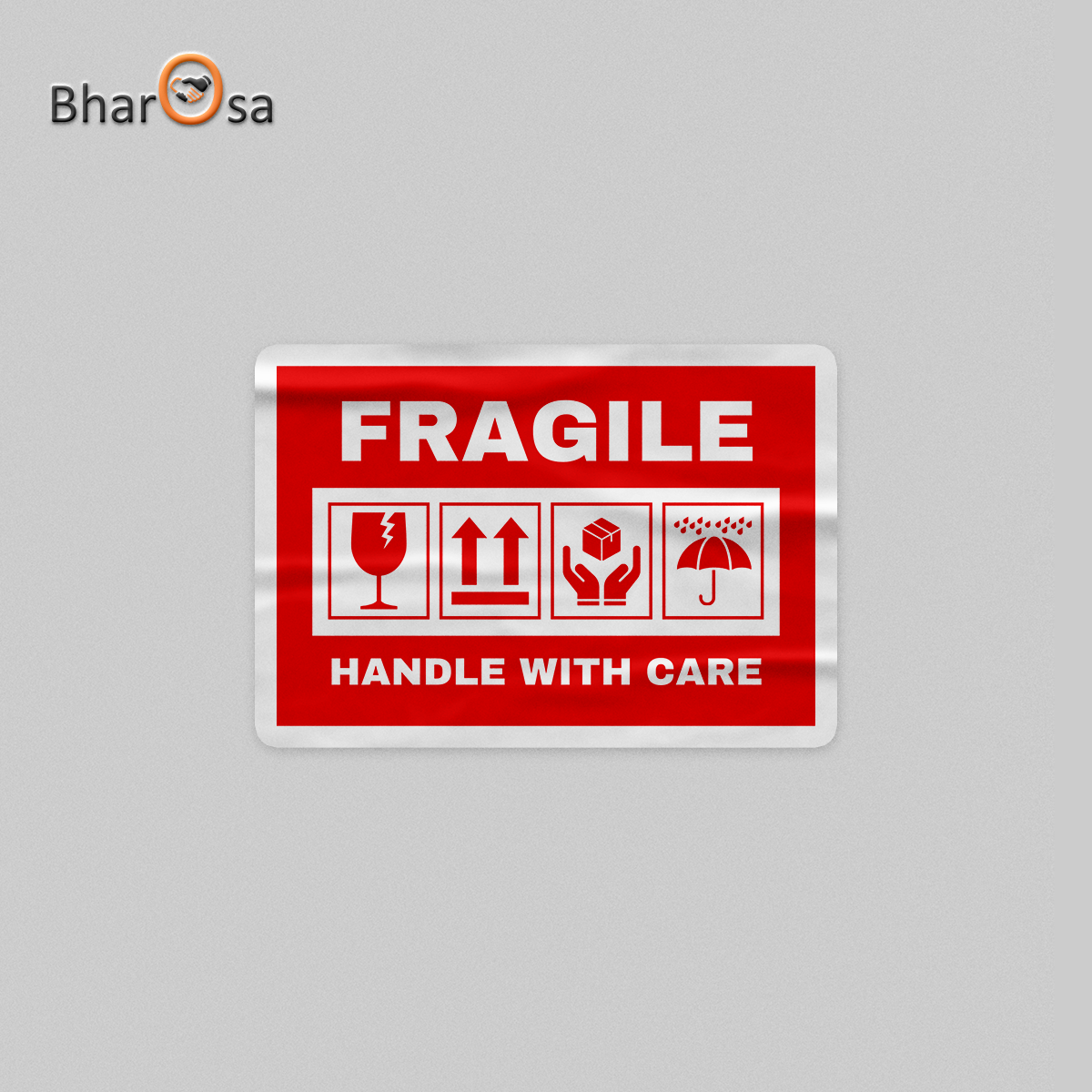 Fragile handle with care sign on a gray background